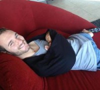 Nick Vujicic kisfiával